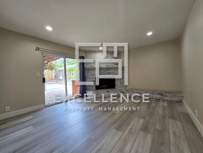 Building Photo - Beautiful 3/2.5 Home With 2 Fireplaces, Updated Kitchen, Spacious Yard and Covered Patio