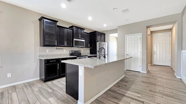 Building Photo - Amazing home for the money! Gorgeous backyard!