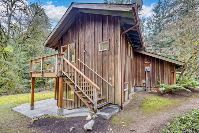 Building Photo - A unique home in the woods near Gazzam Lake