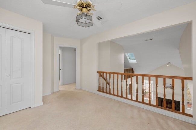 Building Photo - Spacious 3BR Retreat with Soaring Ceilings & Screened Porch
