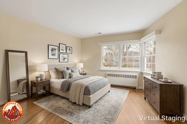 Building Photo - Bright & Inviting 2-Bedroom Home with Fenced-In Yard, Garage & Lawn Care Included