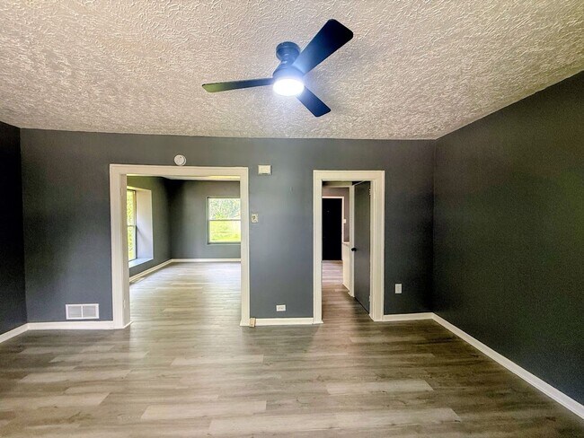 Building Photo - Three bedroom one bathroom single-family home for rent