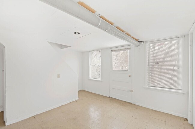 Building Photo - JUST LOWERED! EXPERIENCE THE ULTIMATE SAVI...