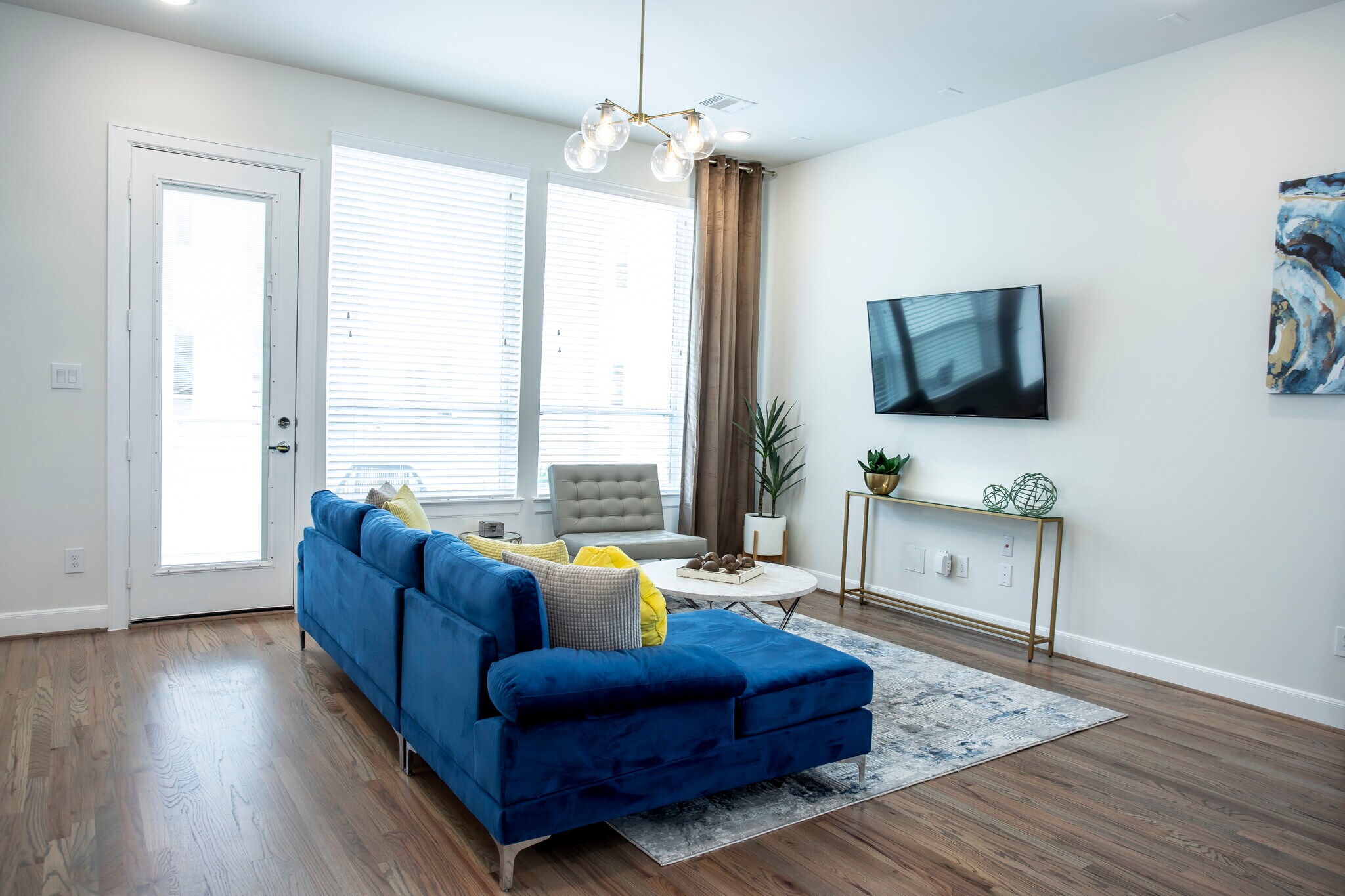 The living room overlooks the patio. - 2713 Eado Edge Ct
