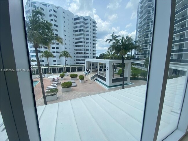 Building Photo - 10275 Collins Ave