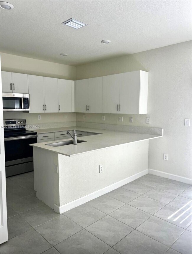 Building Photo - 11444 West 33rd Ct