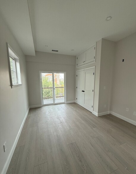 Bedroom 1 (with walkout porch) - 131 Boston St