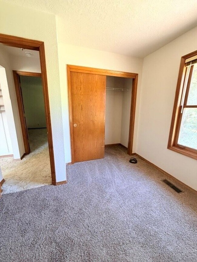 Building Photo - Charming 3-Bedroom Home with Garage & Lawn Care Included