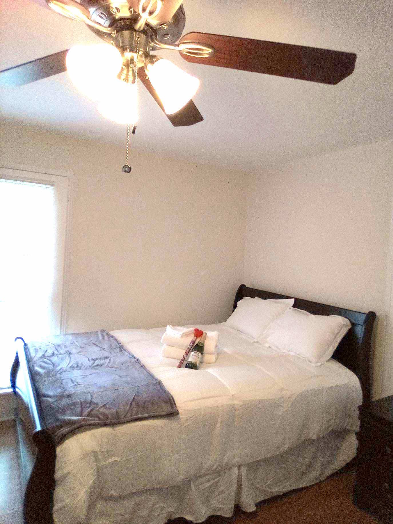 Furnished bedroom with dresser, bed and night stand. $575.00 Unfurnished available $525.00 - 526 Monroe St