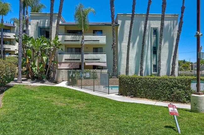 Building Photo - $500 Move In Special-Spacious Condo with Dual Master Suites Just Minutes Away from SDSU