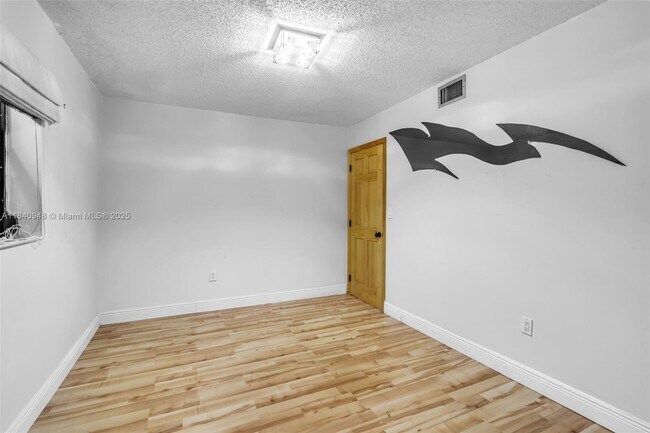 Building Photo - 12845 SW 49th Terrace