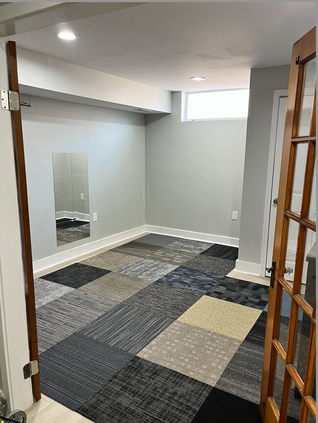 Basement bedroom/rec room - 260 S Highland Ave