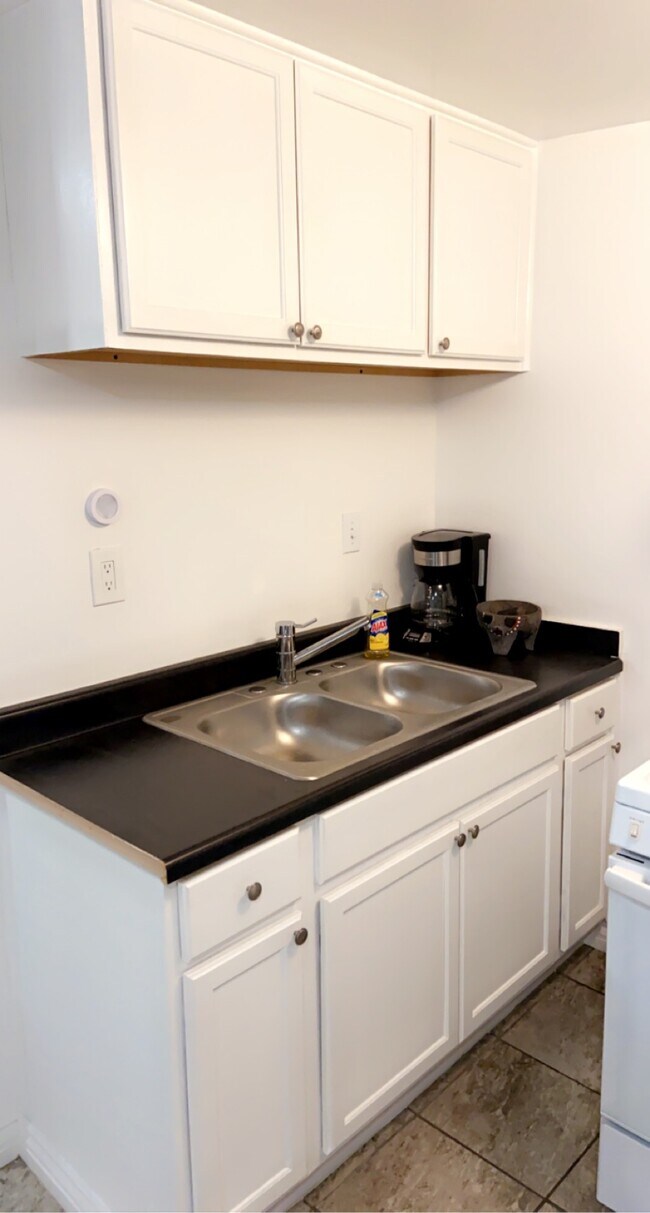 Double compartment sink, with counter space & overhead cabinets - 16208 E Kingside Dr