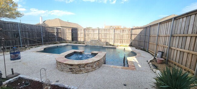 Building Photo - Spacious 4-Bedroom Home with Pool & Spa in...