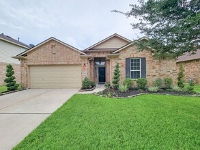 Building Photo - Welcome to this charming one-story home fe...