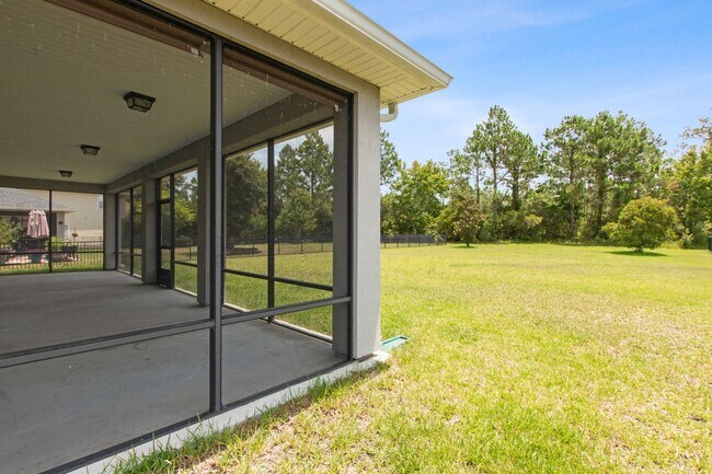 Building Photo - Spacious 4-Bedroom Home in Amelia Walk wit...