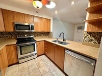Building Photo - Partially furnished 2 bedroom / 2 bath con...