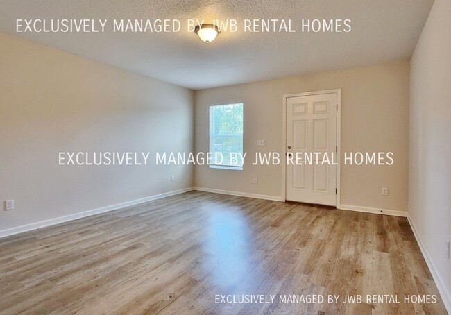 Building Photo - 8476 McGirts Village Ln