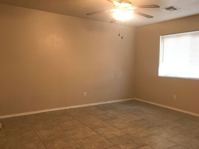 Building Photo - 3-Bedroom Single Family Home with Central Cooling, Attached Garage, and Tile Flooring