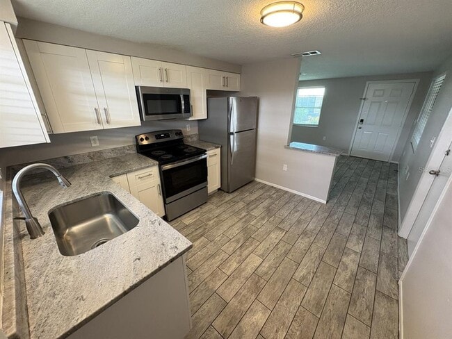 Building Photo - 308 Colonia Ln E