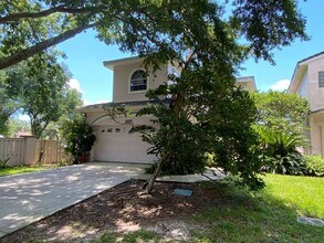 Building Photo - 3 Bedroom 2.5 Bath Cinnamon Bay Home with Stunning view, and Hardwood Flooring!