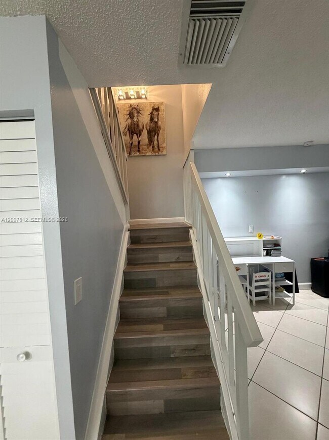 Building Photo - 6580 W 24th Ct