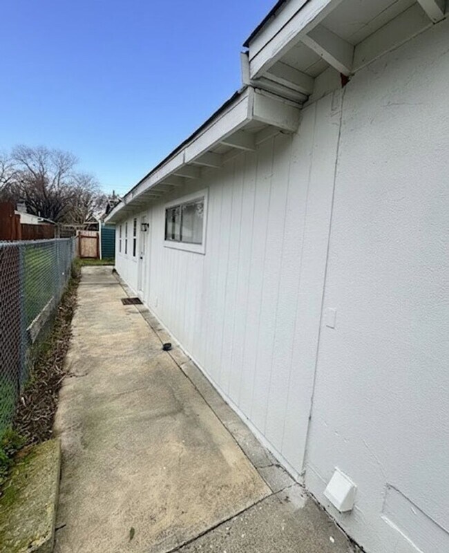 Building Photo - Conveniently Located Home with Attached Studio!