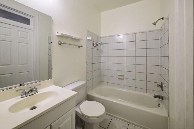 Building Photo - Historic & Charming 3BR Rowhouse near Howard is Move-in Ready!