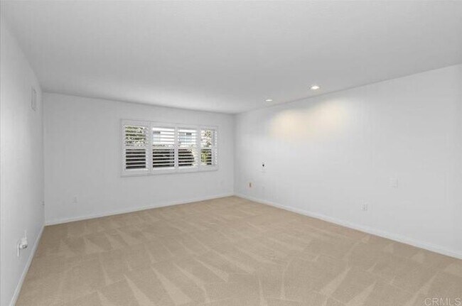 Building Photo - Poolside Living at Its Finest – Turnkey 3BR Condo with Direct Patio Access to the Pool