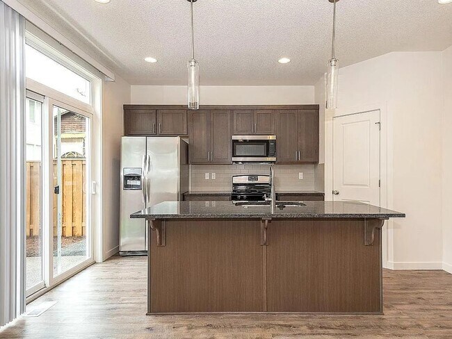 Building Photo - 9754 SW Windswept Place ~ MOVE IN SPECIAL! 1/2 Off 1st Months Rent!! Beautiful & Spacious Home