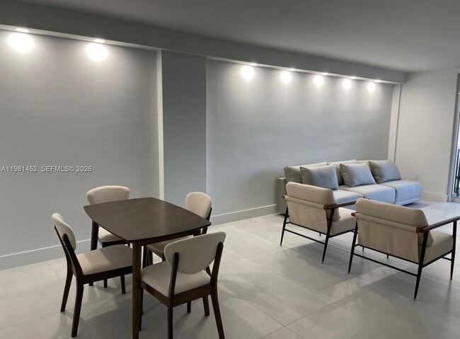 Building Photo - 10275 Collins Ave