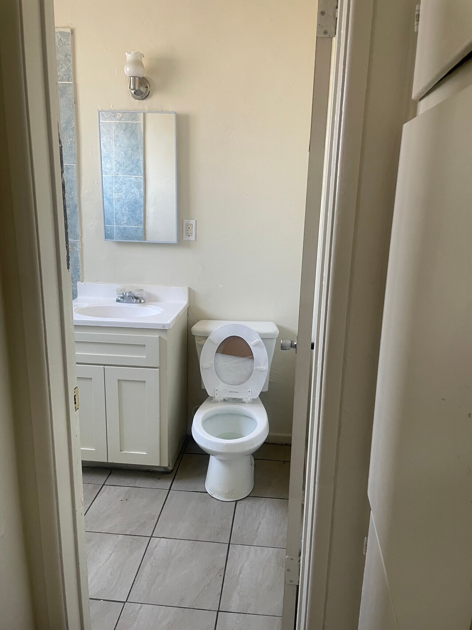 Bathroom entrance through bedroom - 7339 McKinley Ave