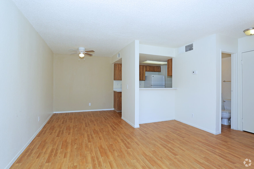 1BR, 1.5BA - 850 SF Living Room - Tamarus Park Apartments