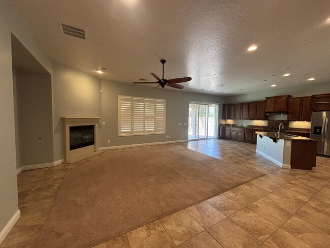 Building Photo - 5-Bed Retreat with Granite Elegance & Cozy Fireplace – 3690 Sq Ft of Comfort in Las Vegas with a ...