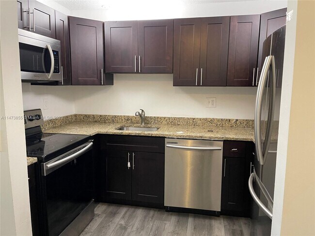 Building Photo - 11586 Royal Palm Blvd