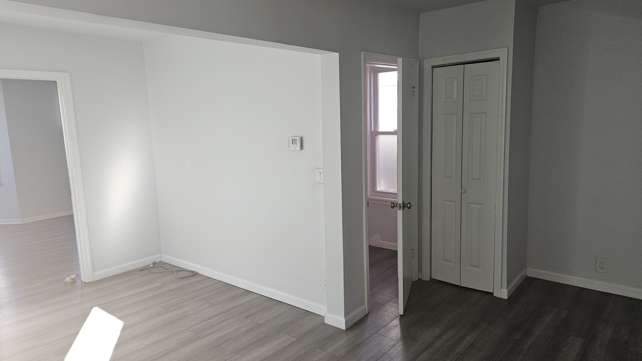 Living room showing unit front door - 31 Marne St