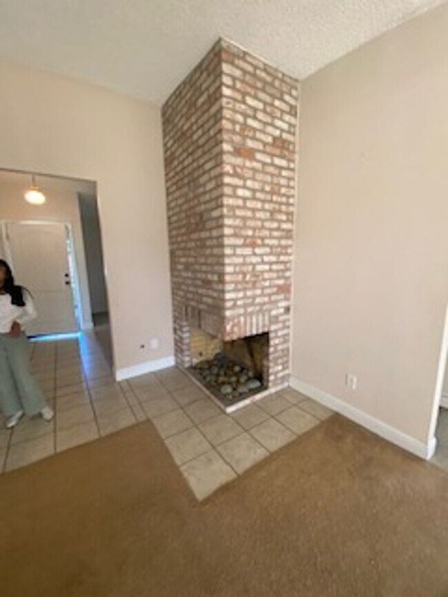 Building Photo - Huge semi-private Backyard with Large Patio!