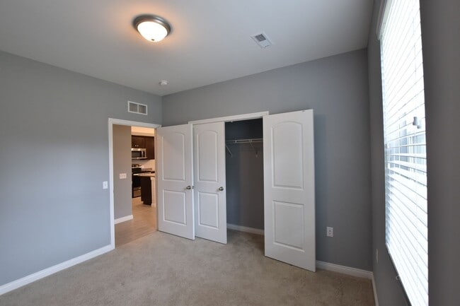 Building Photo - Shelby Township, 1st Floor Access!  2 Bedrooms, 2-Baths, att. Garage