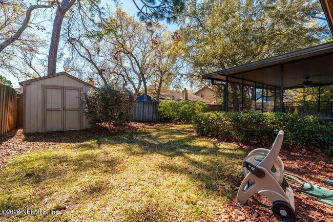 Building Photo - 8066 Le Havre Dr N