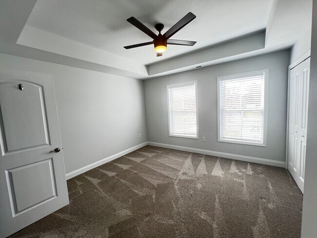 Building Photo - Available Now! - Pet Friendly 2 Bedroom, 2.5 Bath Townhome at Market Common! Cable and Internet I...