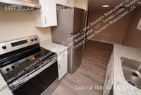 Building Photo - 5997 Village Cir N