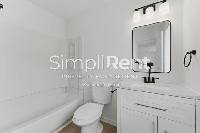 Building Photo - Updated Home with Spacious Layout & Private Backyard