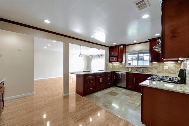 Building Photo - Beautifully Updated Single Family Home with Sparkling Pool