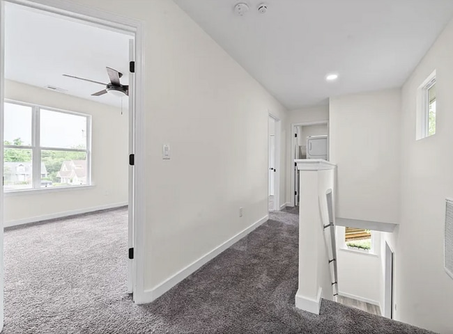 Building Photo - 4 Bedroom Home with Main-Level Primary and Fenced Backyard