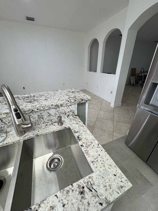 New granite countertops - 4296 SW 131st Ln