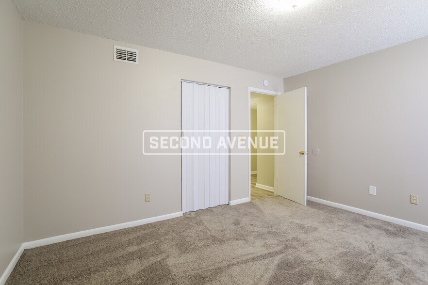 Building Photo - 8781 Whispering Pines Dr