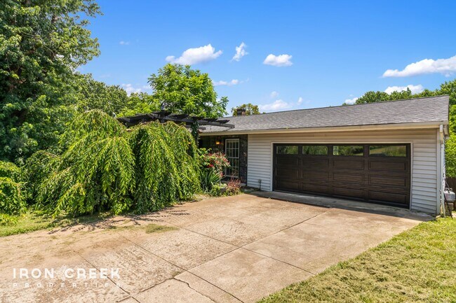 Building Photo - Beautifully Updated Three-Bedroom with Koi...