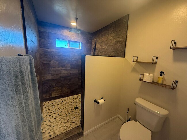 Building Photo - 4BR/2BA HOME w/ attached garage, usable land, fenced in back yard in CAMPO available!