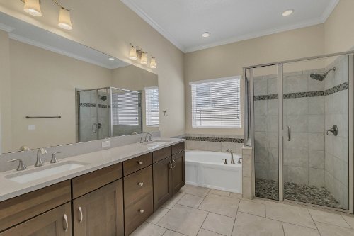Owner’s bath. - 16413 Good Hearth Blvd