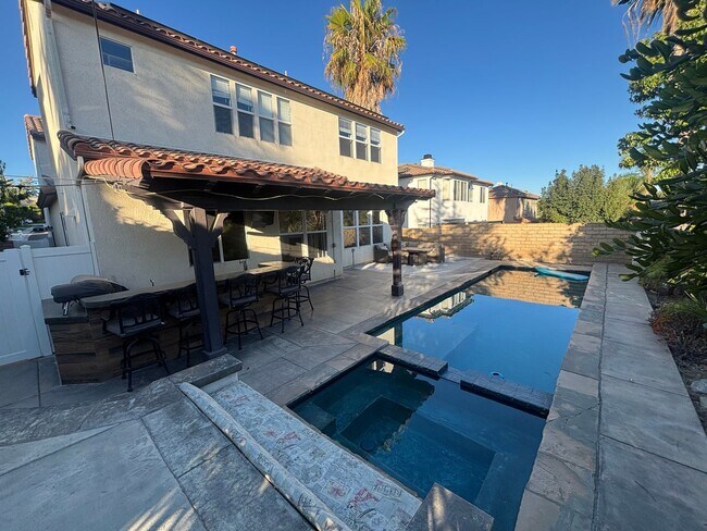 Building Photo - Stunning 5-Bedroom Pool Home with Private ...